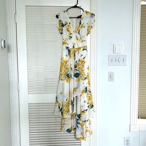 White yellow floral dress for spring summer. Good wedding guest dress.